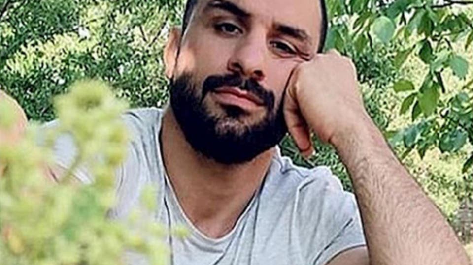 پیکر نوید افکاری در فضای شدید امنیتی به‌خاک سپرده شد